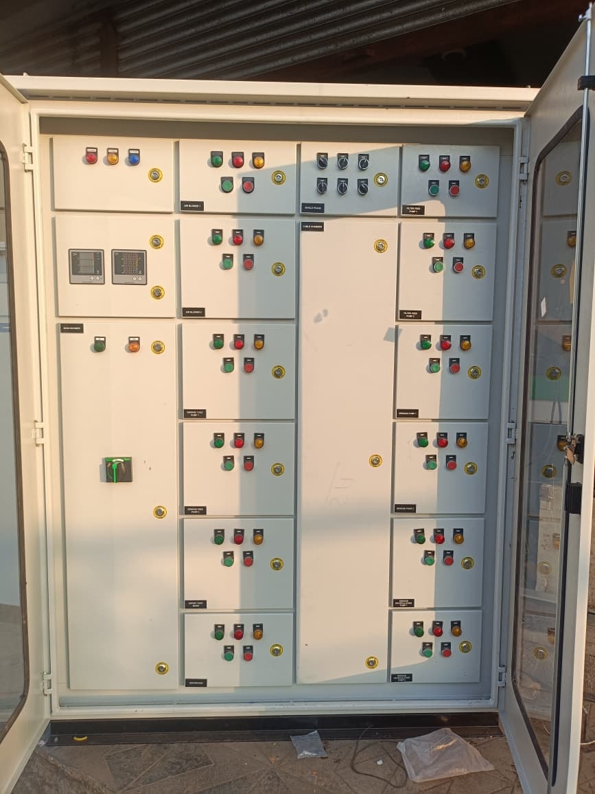 Multi-section MCC panel with Danger warning labels