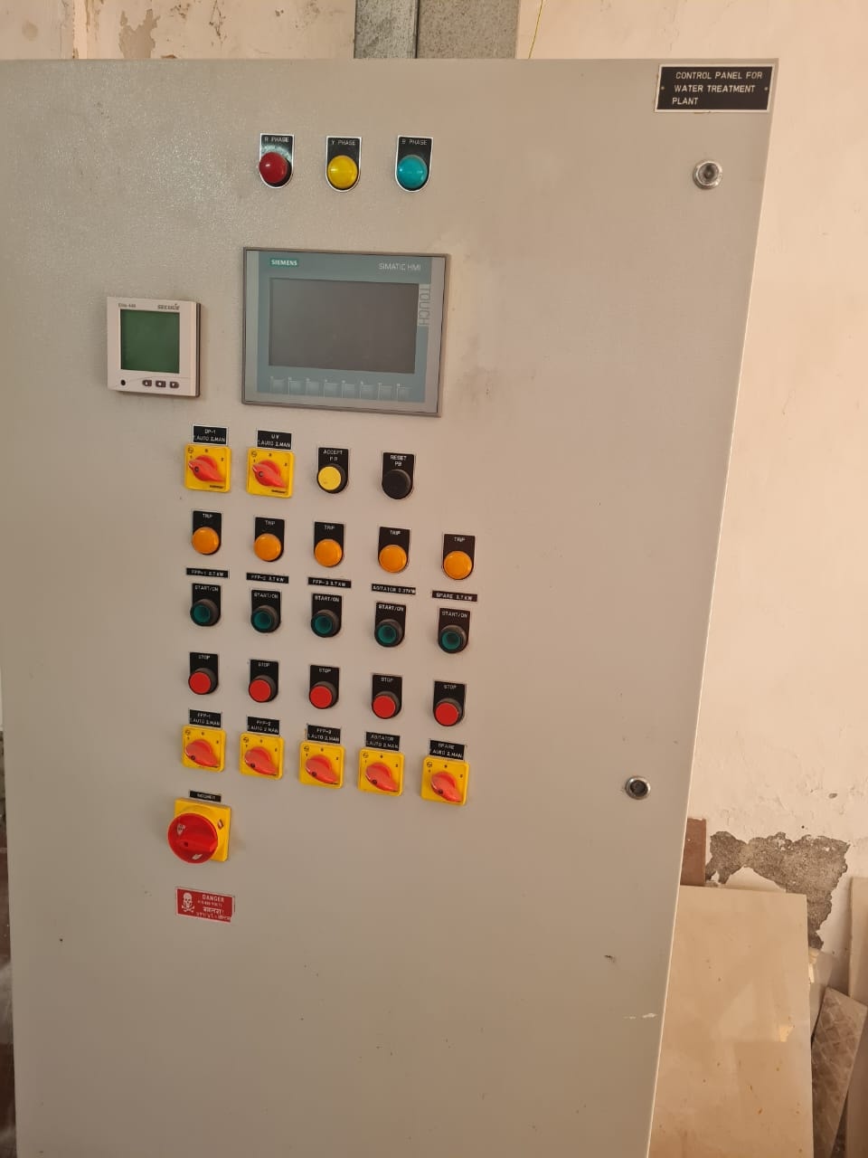 Water treatment plant control panel with Siemens HMI display